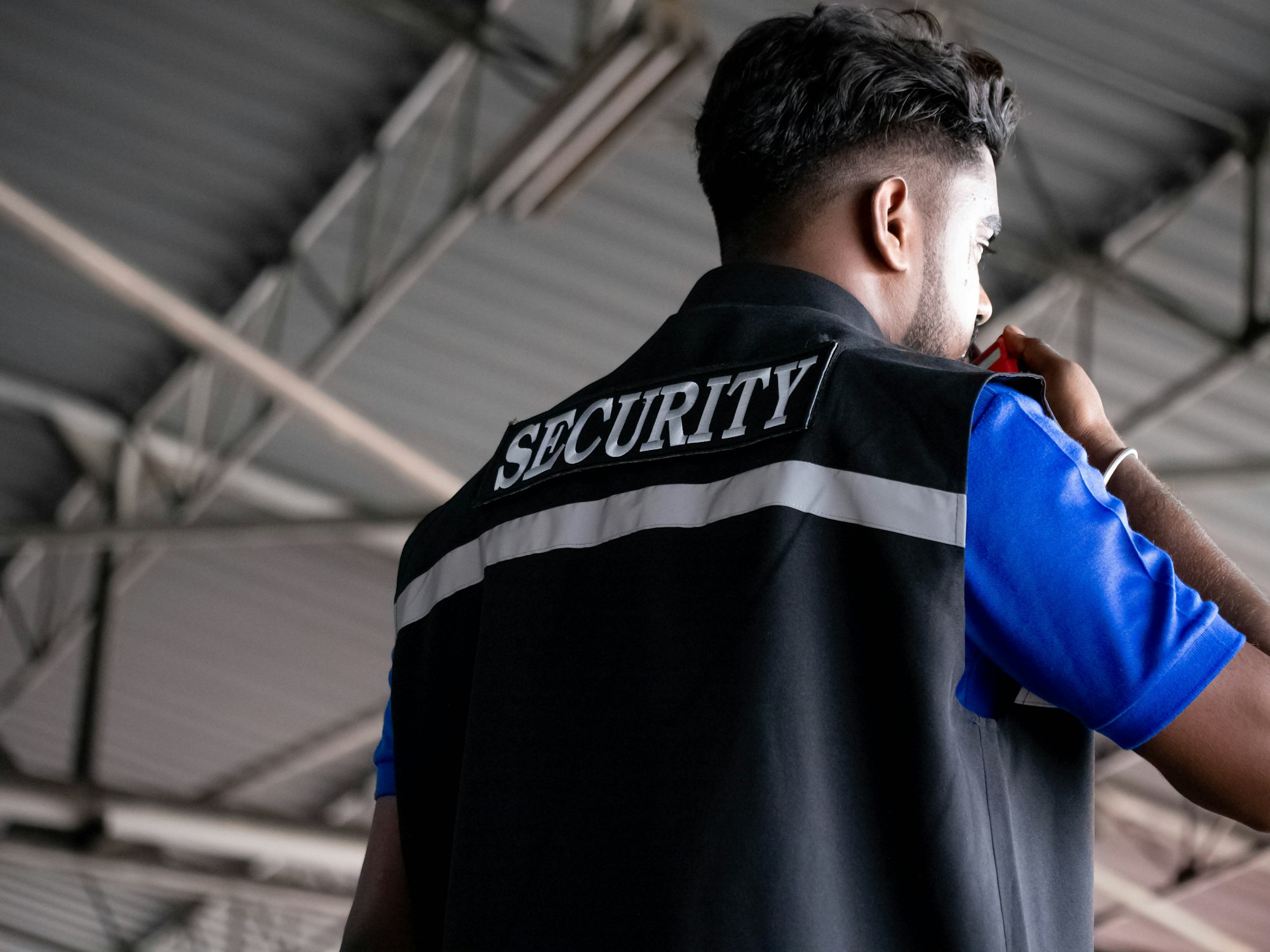 Security guard inside a shopping centre in Leeds