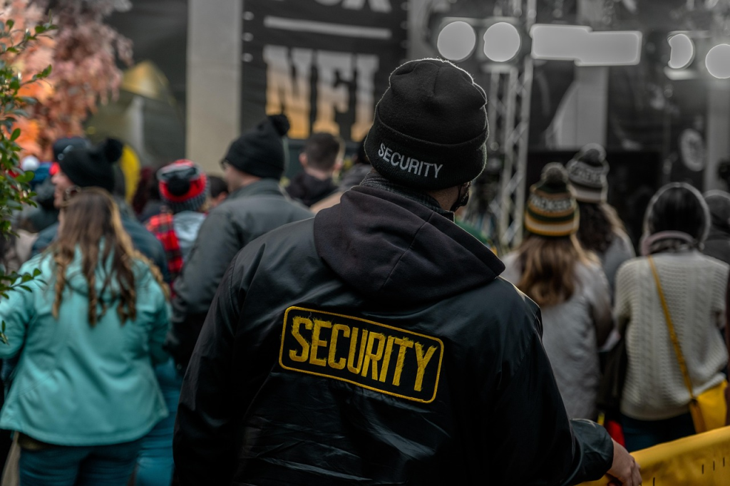 a security guard managing a crowd