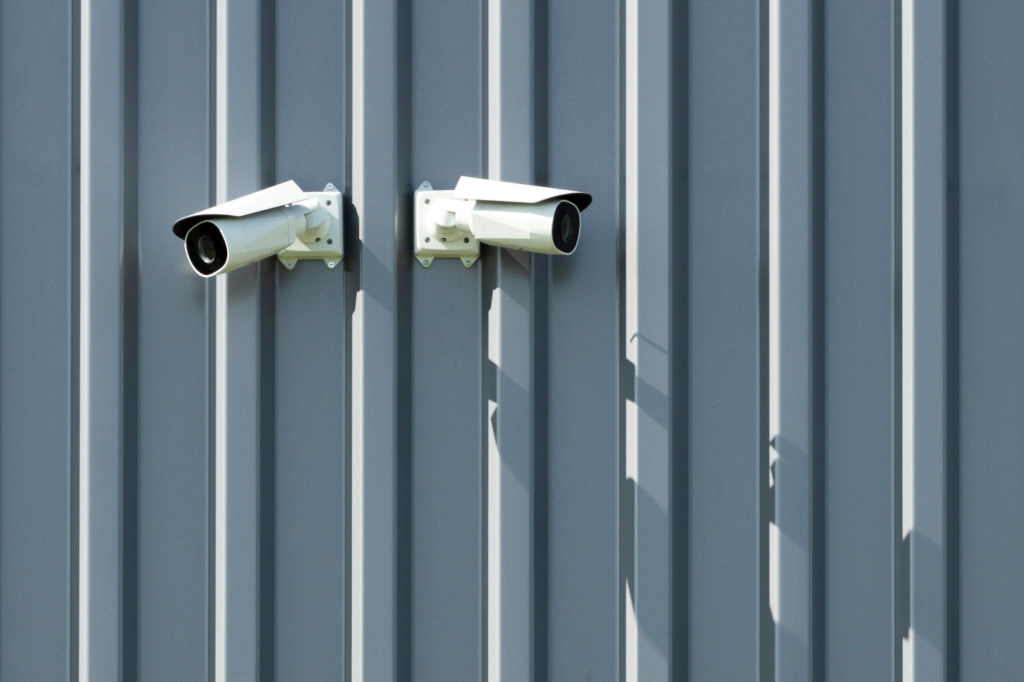 Two CCTV cameras pointing in opposite directions