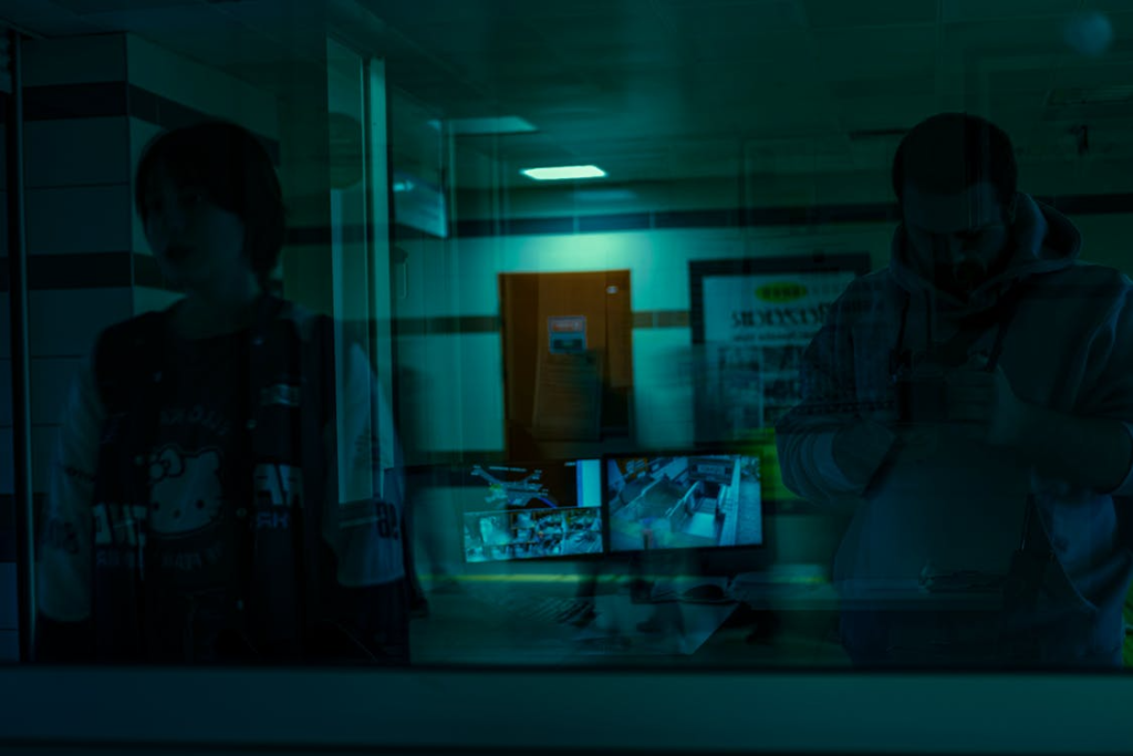 two monitors in the control room with CCTV footage