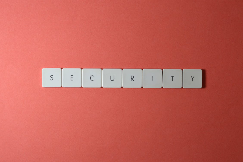Close-up of keys placed on a red surface