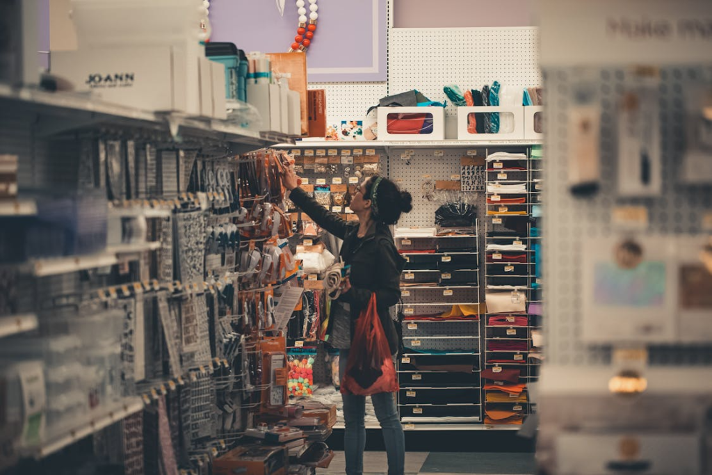 Woman browsing items while shopping in a store