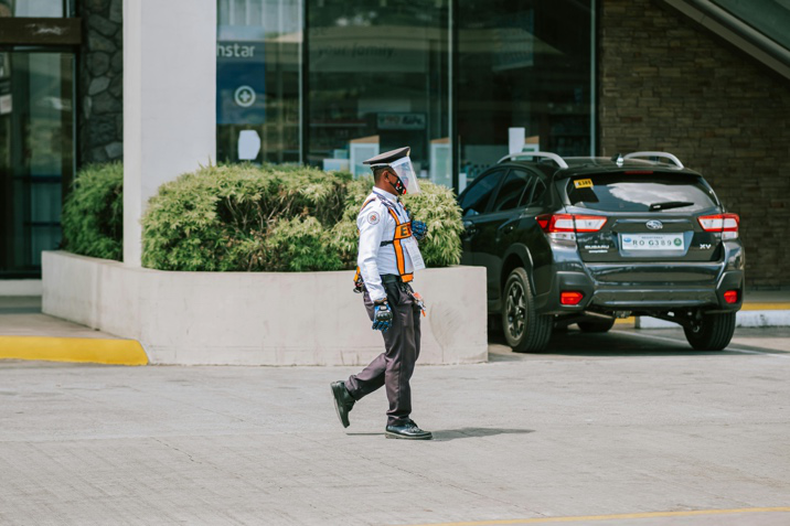 Security guard patrolling a commercial property to maintain safety