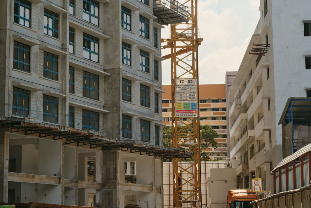 tower crane over a busy construction site