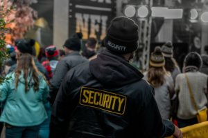 a security guard monitoring a public space